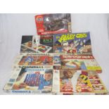 A collection of vintage games including Connect 4, Guess Who, Downfall, The Alley Cats, Rubiks