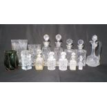 A quantity of cut glass including, decanters, perfume bottles, vases etc.