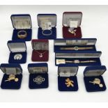 A collection of Camrose & Kross Jackie Kennedy replica jewellery pieces including watches, brooches,