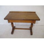 An oak side table, length 103cm, height 77cm.