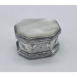 A 925 silver pill box with mother of pearl inset to lid