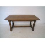 An oak dining table, length 168cm, height 76cm, depth 76cm.