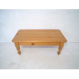 A pine coffee table, length 102cm, width 60cm, height 51cm.