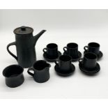 A studio pottery coffee set with coffee pot, jug, bowl and five cups and saucers