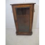 An Edwardian inlaid walnut veneered display cabinet, no shelves present.