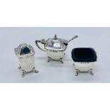 A 3 piece hallmarked silver condiment set, Chester 1938