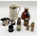 A collection of china and Toby jugs including Royal Doulton