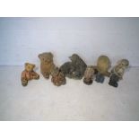 A quantity of garden ornaments, including some reconstituted stone, in the form of hedgehogs, bears,