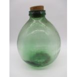 A Viresa green glass carboy - height approx. 40cm