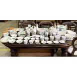 A large collection of Portmeirion including tureens, storage jars, ramakins, vases, clock, rolling