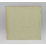 The Beatles White album double 12" vinyl record, No. 0352205, with original black paper inner