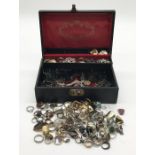 A collection of costume jewellery including a large number of rings