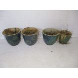 A pair of glazed garden plant pots, along with two others.