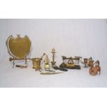 A quantity of brass and metal items, including a gong, trench art crucifix, postage scales,