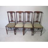 A set of four Art Nouveau dining chairs.
