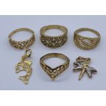 Four 9ct gold rings along with two 9ct pendants/charms, total weight 9.9g
