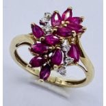 A 9ct gold ruby and diamond dress ring