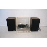 A vintage Hitachi Turntable Model HT-324, along with a Hitachi Stereo Receiver Model SR-2010L and