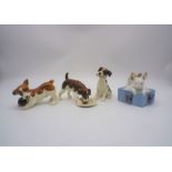 Three Beswick dogs, along with a Lladro figure of two rabbits, A/F.