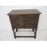 A carved oak sideboard, with two drawers and cupboard, length 65cm, height 84cm, depth 41cm.