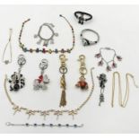 A collection of Butler & Wilson costume jewellery including keychains, bracelets, necklaces etc.