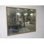 A gilt framed wall hanging mirror - overall size 80cm x 66cm