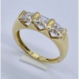 A 14ct gold three stone ring, weight 3.4g