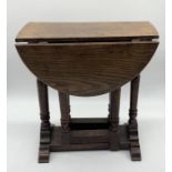 A small oak gateleg side table