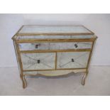 A mirrored sideboard, with single drawer and cupboard under, length 103cm, height 86cm.