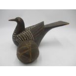 A wooden folk art pigeon (length 25cm) along with an Oriental pottery "ball of string"