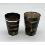 Two horn beakers edged and lined with silver plate