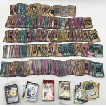 A collection of trading cards including a large number of Yu-Gi-Oh, some Pokemon, Quickstrike,