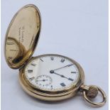 A gold plated full hunter pocket watch with subsidiary seconds hand