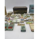 A collection of Albums and Cigarette cards including Churchman, Wills, C.W.S. John Player and