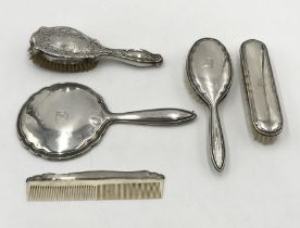 A collection of Sterling Silver dressing table brushes etc. 2 A/F