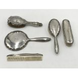 A collection of Sterling Silver dressing table brushes etc. 2 A/F