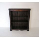 An oak freestanding bookcase, with two shelves, length 96.5cm, height 108cm.