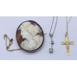 A 9ct white gold necklace and pendant along with a fine 9ct gold chain with yellow metal crucifix