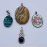 Four 925 silver pendants set with malachite, onyx etc.