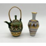 A small ceramic vase and teapot by Mary Rich both with geometric gilt design