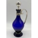 A unique commissioned Bristol Blue Glass decanter made by Steve Baker and Innes Blair with silver