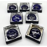 Seven boxed Bristol Blue Glass paperweights on the subject of planes including a number of limited