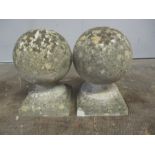 A pair of stone ball finials. Approximate diameter 77cm.