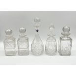 Five cut glass decanters including two by Edinburgh Crystal