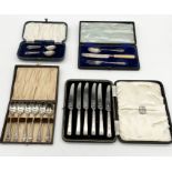 A set of cased silver handled knives along with various silver plated sets