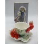 A boxed Lladro figure of a girl holding a basket of flowers (5521) along with a Franz goldfish cup