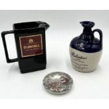 A Dunhill jug, Ballantine's whisky decanter and Victoria pot lid