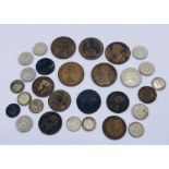 A small collection of British coinage including silver threepenny bits