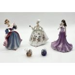 Two Royal Doulton figurines "Amy" and "Diana" along with a similar Coalport figure and two Isle of
