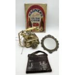 A vintage telephone, leather handbag, brass mirror and reproduction Magner's sign